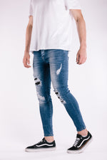 Blue Rip & Repair Studded Jeans